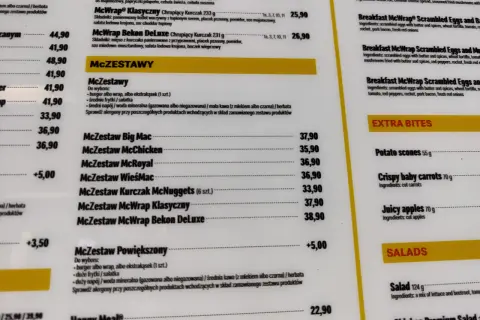Fragment menu McDonald's z cenami zestawów McZestaw i pozycji z sekcji "Extra Bites" oraz "Salads".