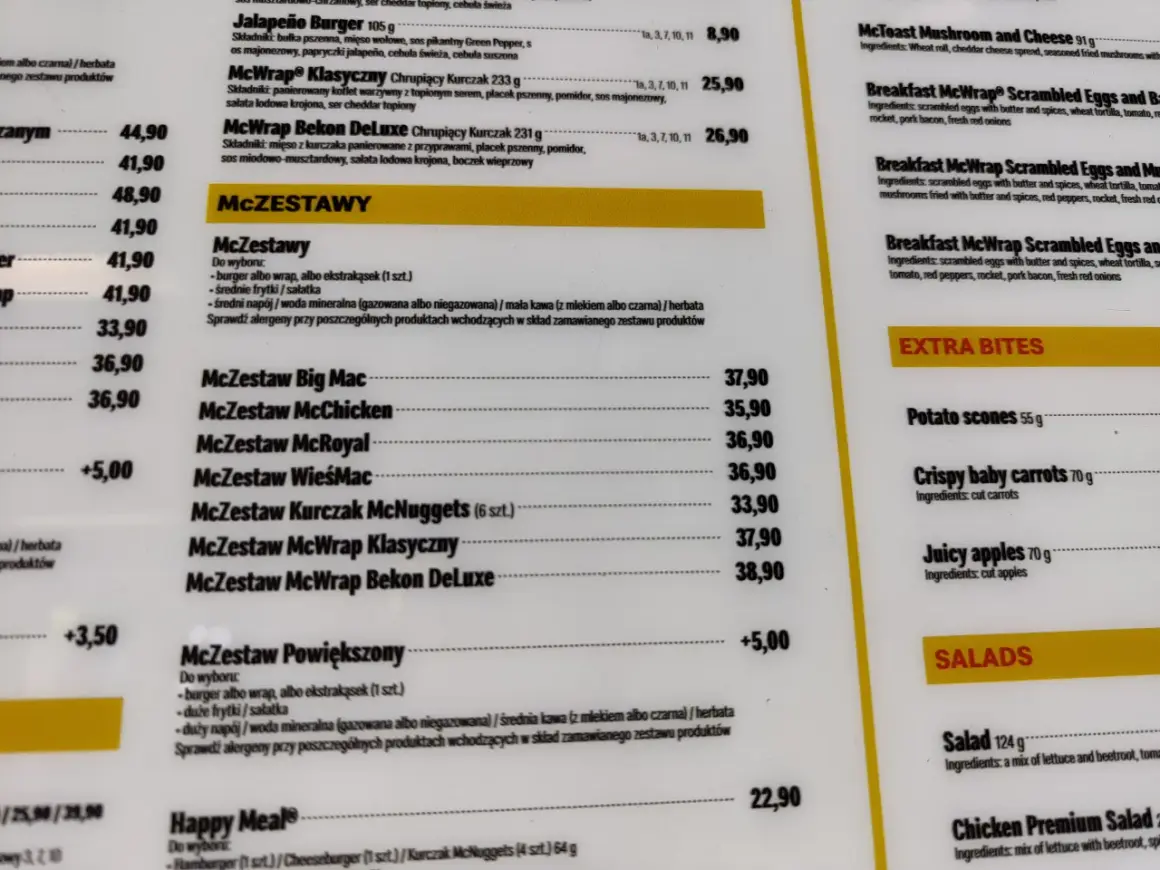 Fragment menu McDonald's z cenami zestawów McZestaw i pozycji z sekcji "Extra Bites" oraz "Salads".