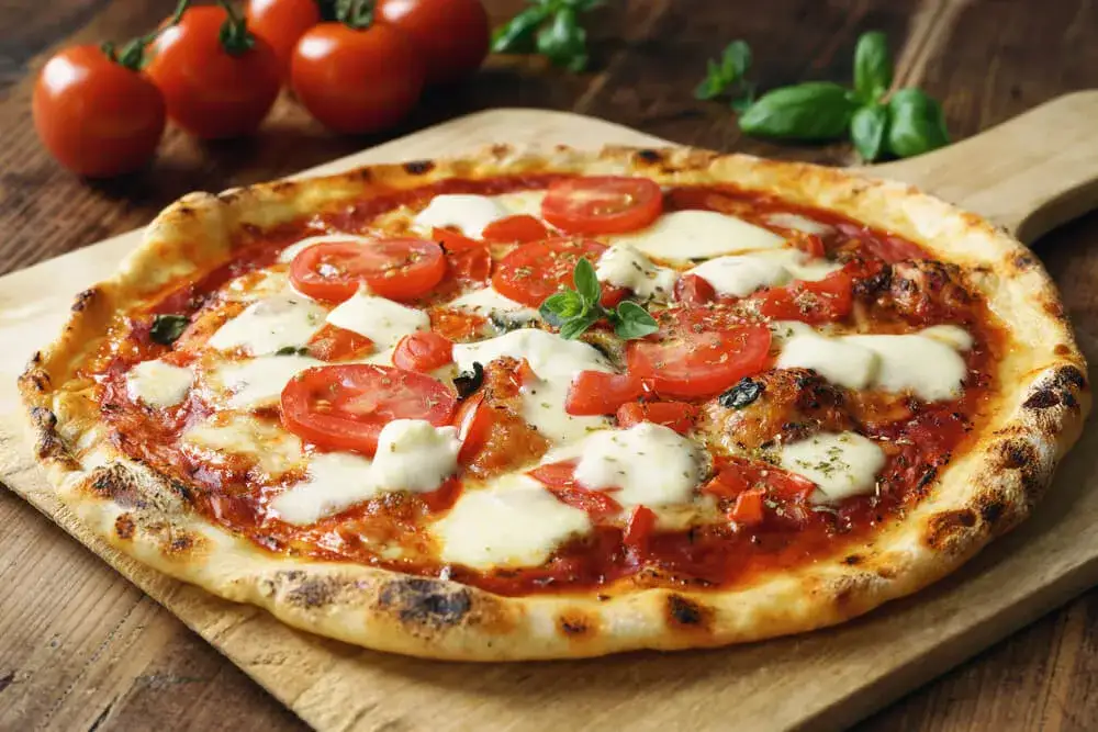 Zdjęcie Z czym pizza? Odkryj najlepsze dodatki, które zachwycą smak